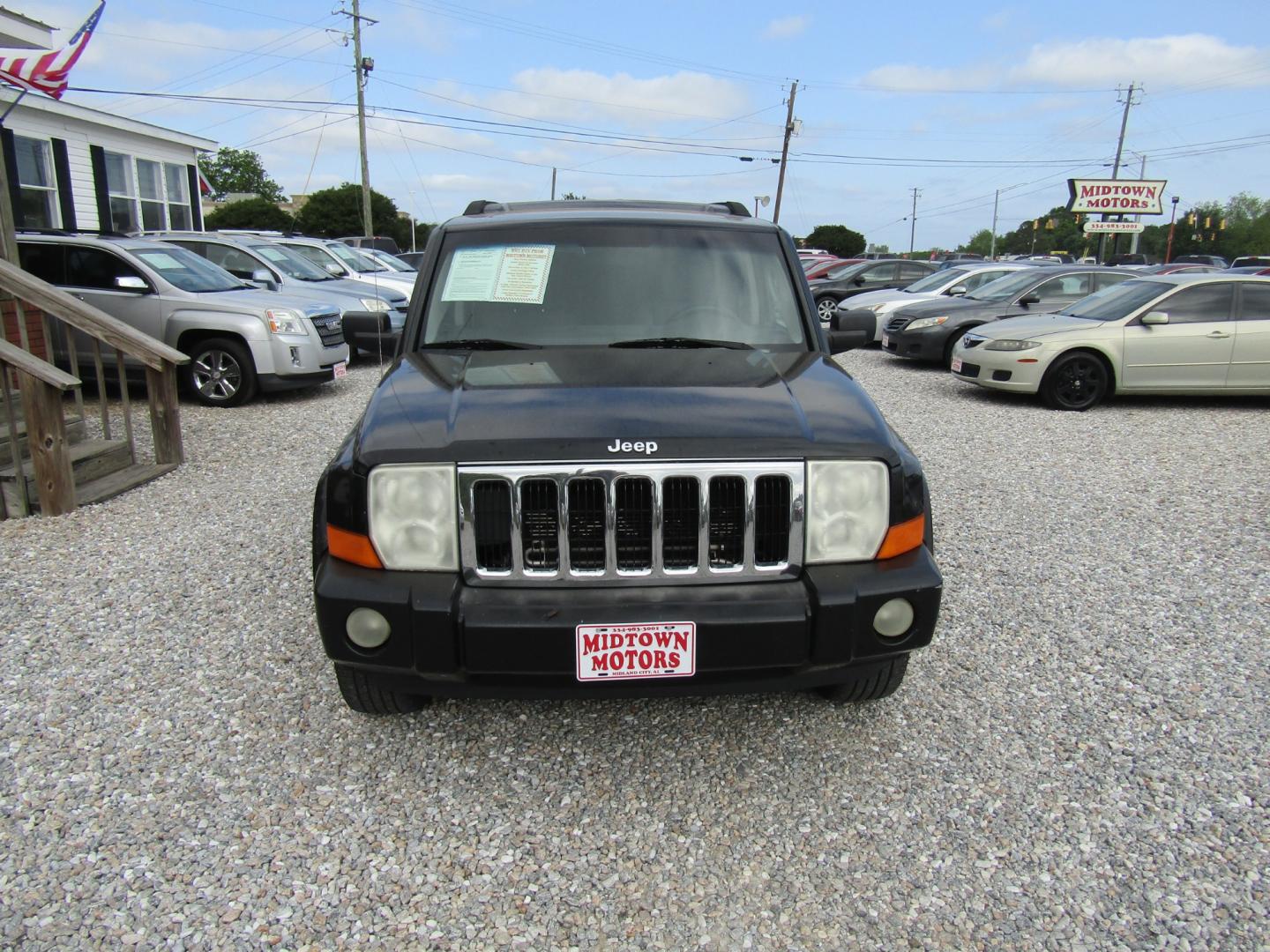 2007 Black /Gray Jeep Commander Sport 2WD (1J8HH48P37C) with an 4.7L V8 SOHC 16V FFV engine, Automatic transmission, located at 15016 S Hwy 231, Midland City, AL, 36350, (334) 983-3001, 31.306210, -85.495277 - Photo#1